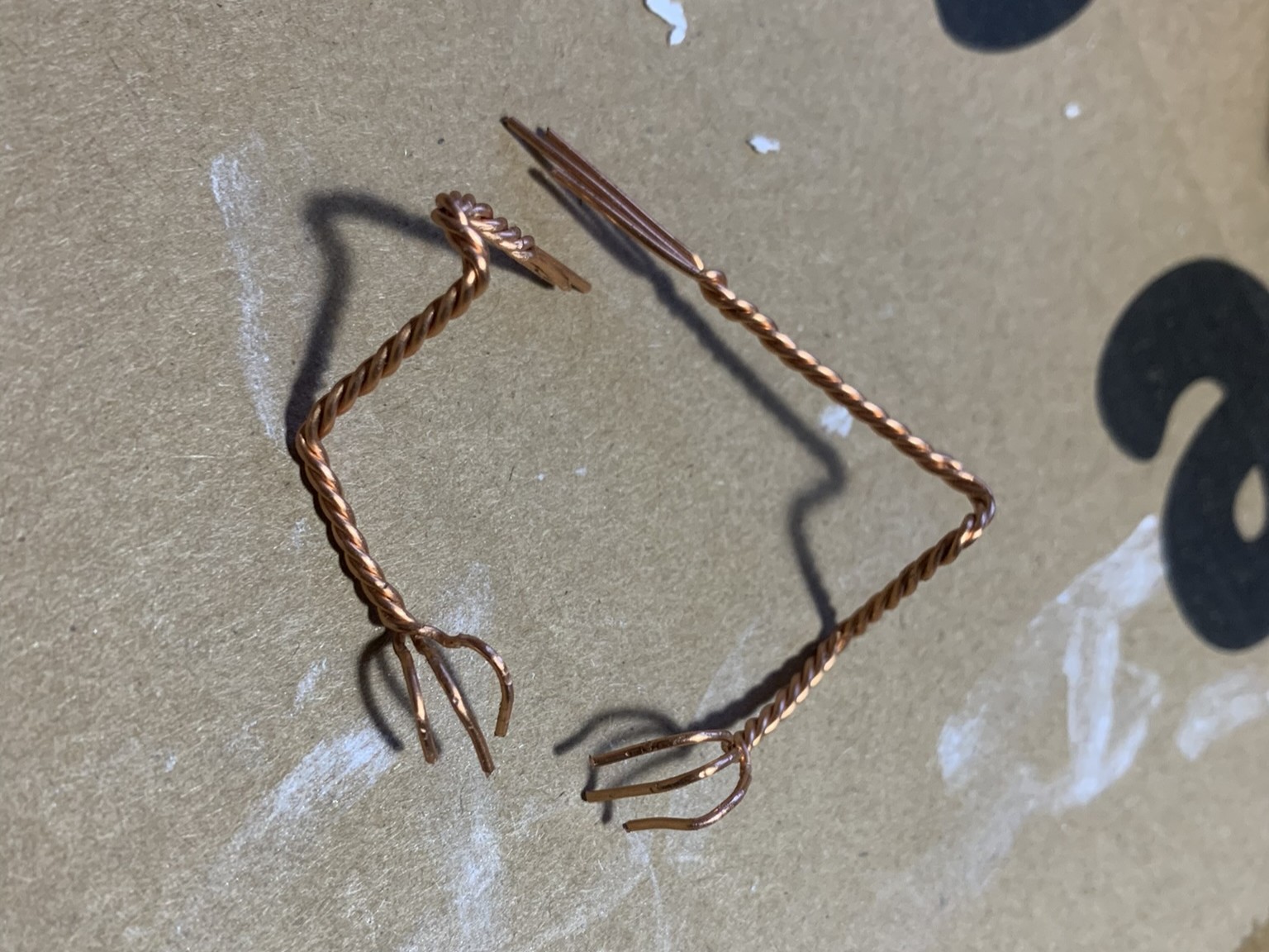 I made wire armatures for the legs and wrapped them in epoxy putty, leaving the claws exposed.