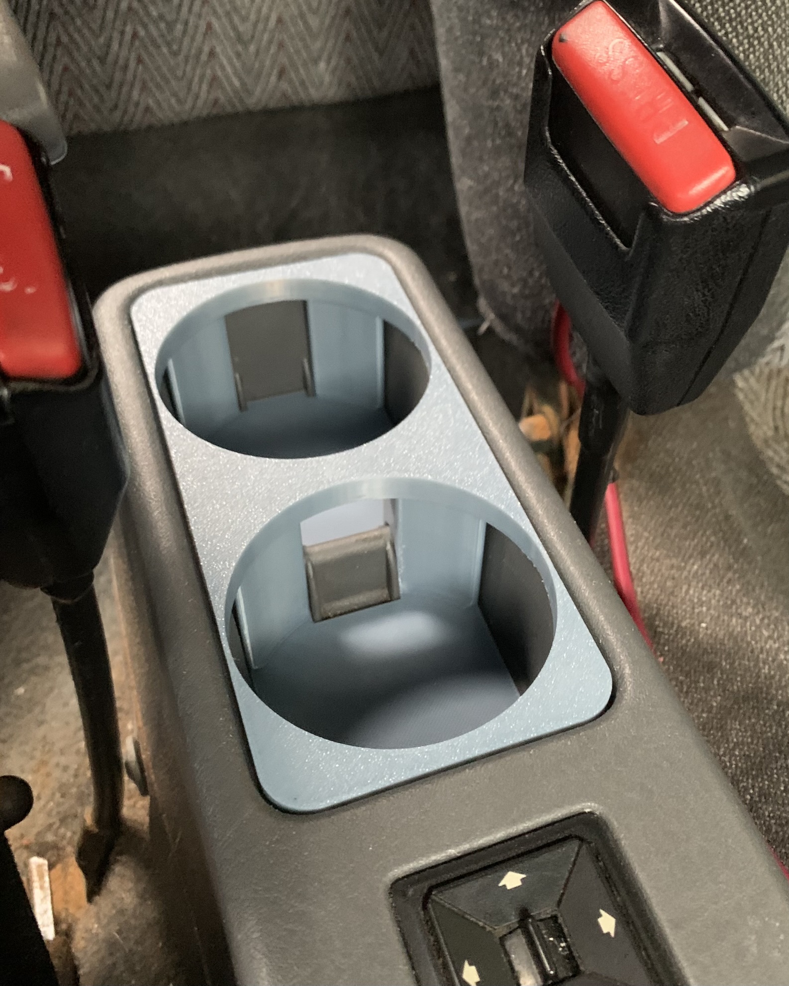 The insert presses securely into to centre console