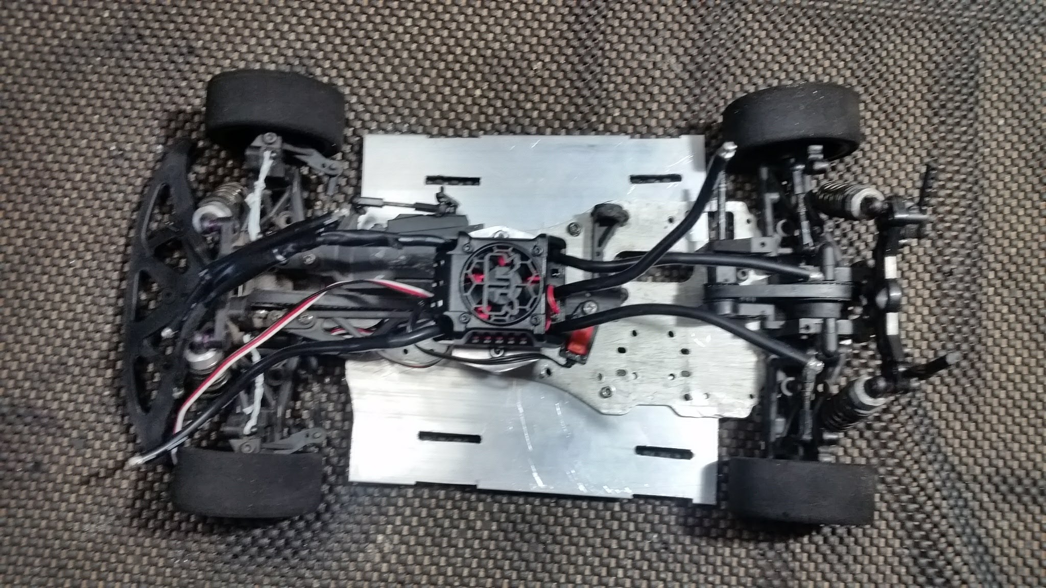 In a quest for more power, I needed more batteries. As such, a fabricated two aluminum plates to widen the chassis.