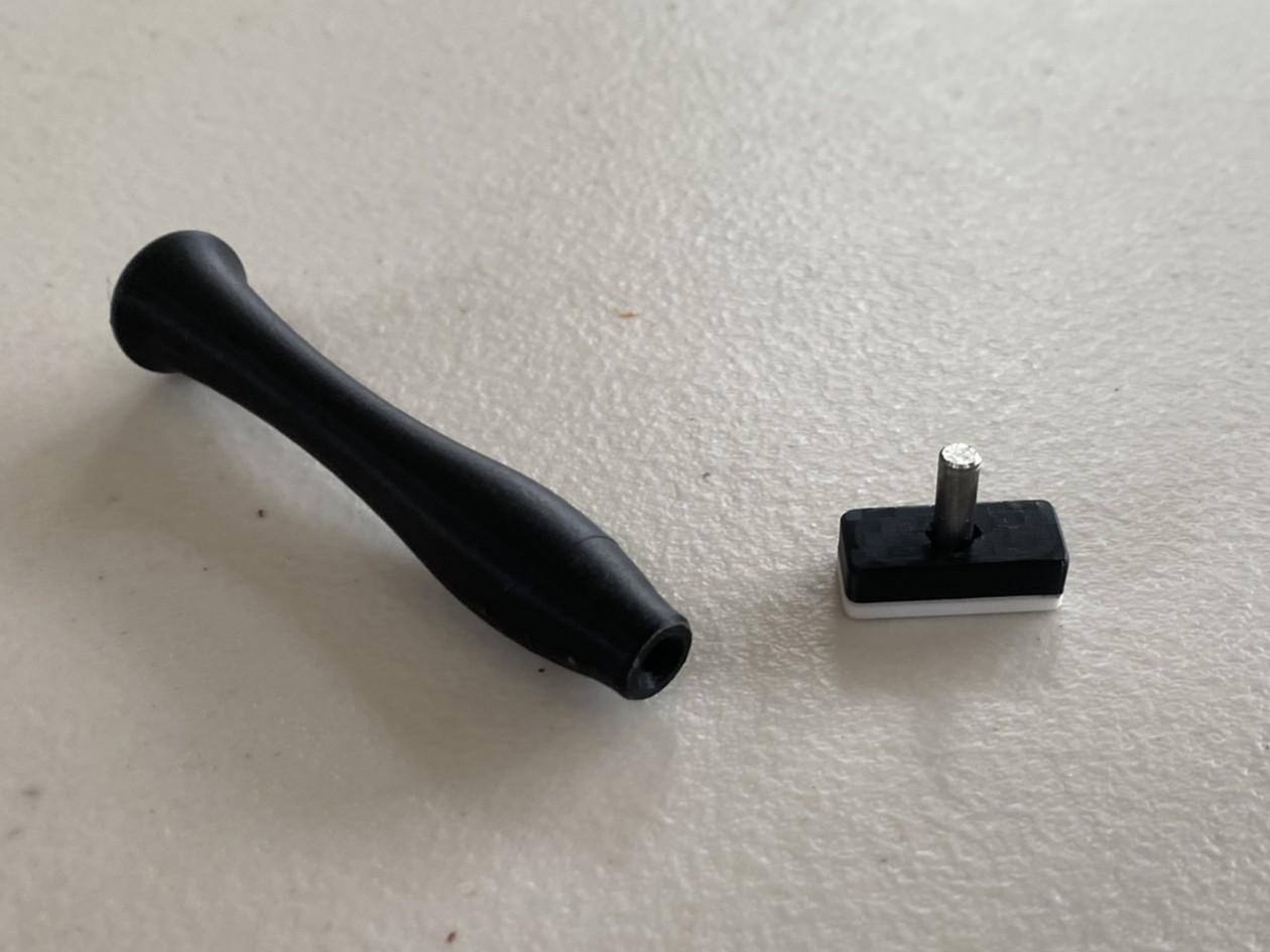 The stamp heads and handle were 3D printed. A steel rod allowed the stamp heads to be inserted into the handle, where a magnet held them securely in place.