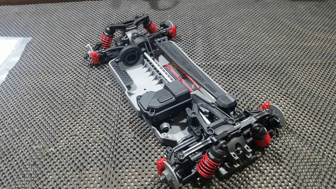 This build started as a rolling chassis. I chose the Traxxas 4-Tec 2.0 for its bulletproof drivetrain and great aftermarket support.