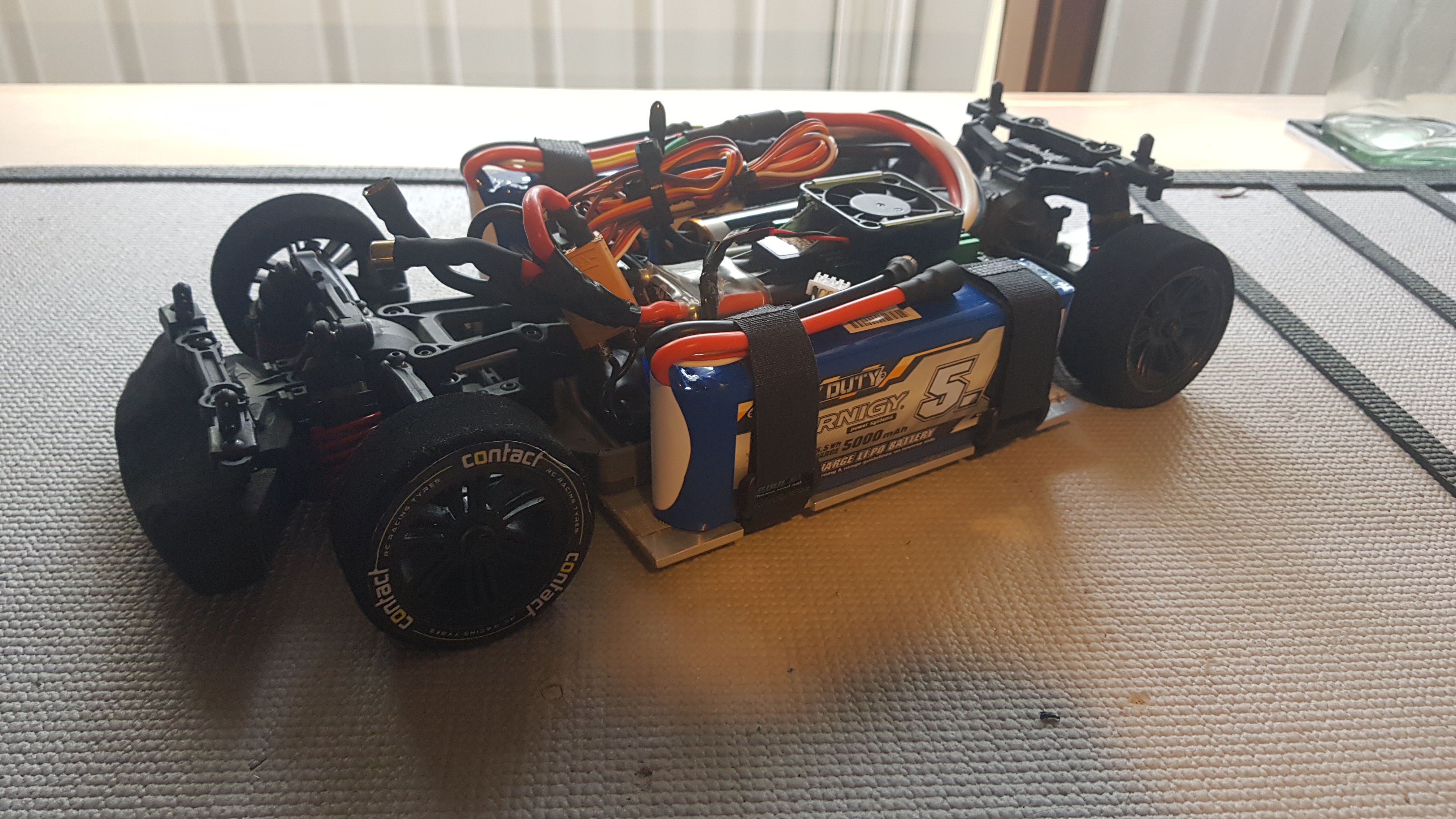 After a rebuild, the car was ready for testing on 6s lipo power. The test didn't last long, as the spur gear wasn't tightened properly. The free spinning spur gear quickly melted the aluminium centre drive shaft. As opportunities to test the car arose only once or twice a year, further testing was never completed.